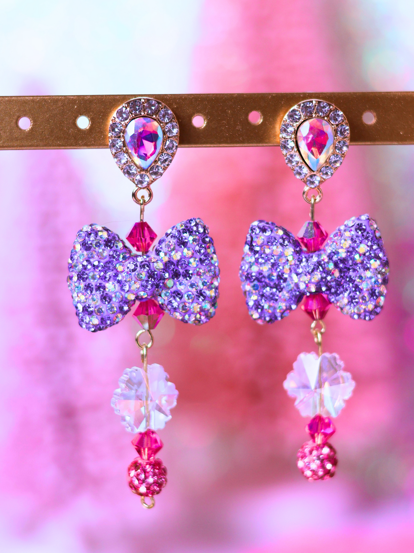 Pink Christmas Collection: Sparkling Bow Drop Earrings – Playful Glam for the Holiday Season