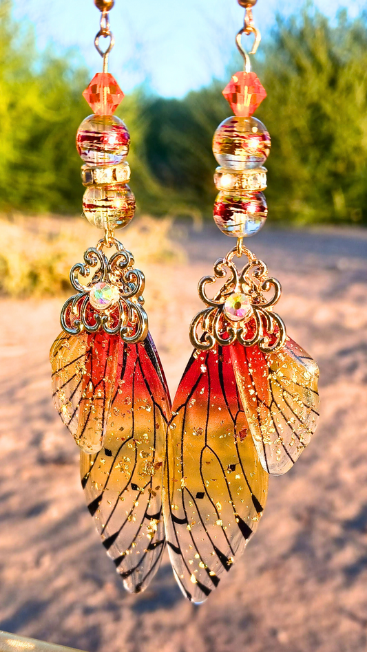 butterfly wing earrings hanging outside 