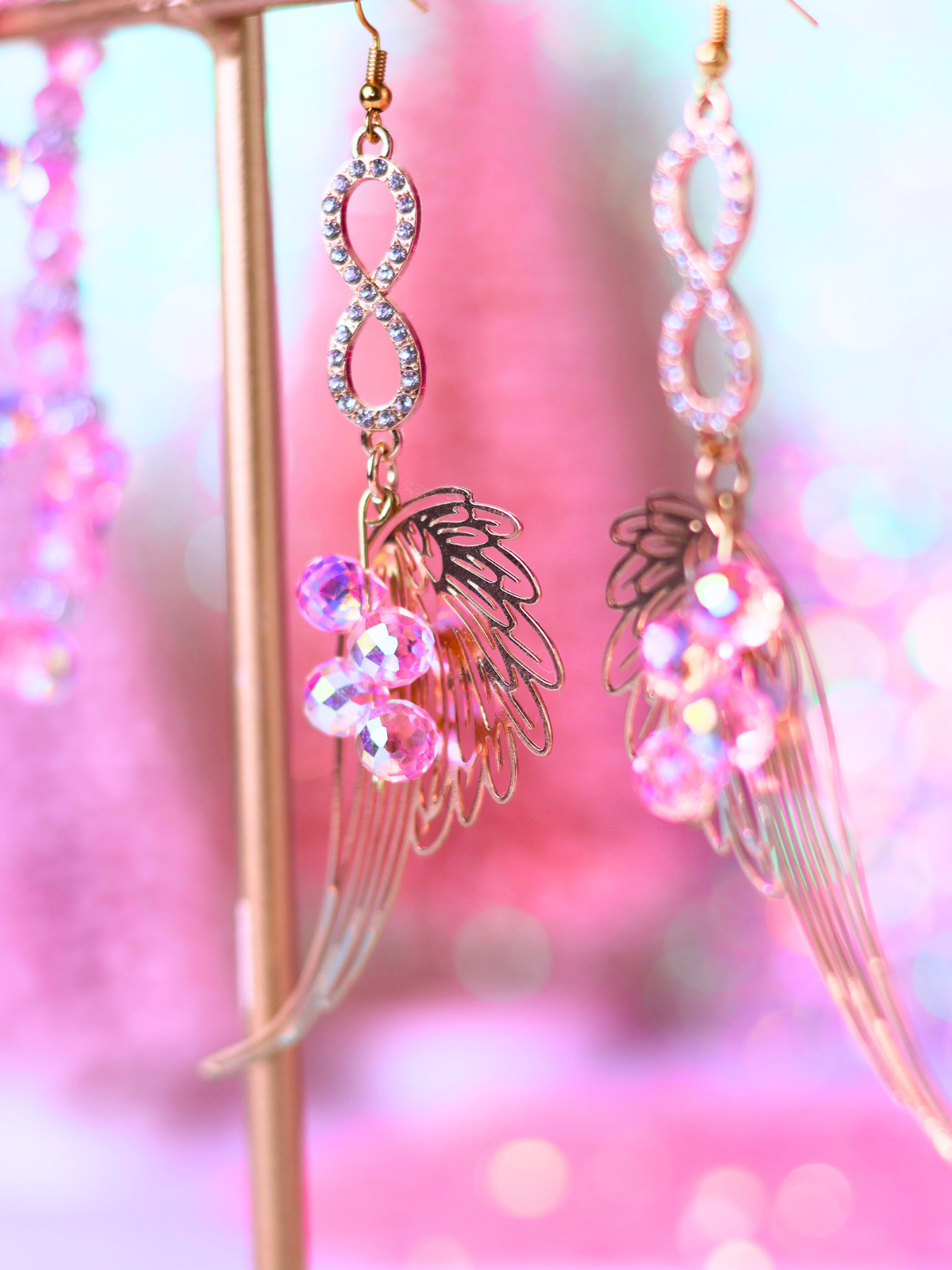 Pink Christmas Collection: Angel Wing Crystal Earrings – Elegant and Whimsical Holiday Jewelry