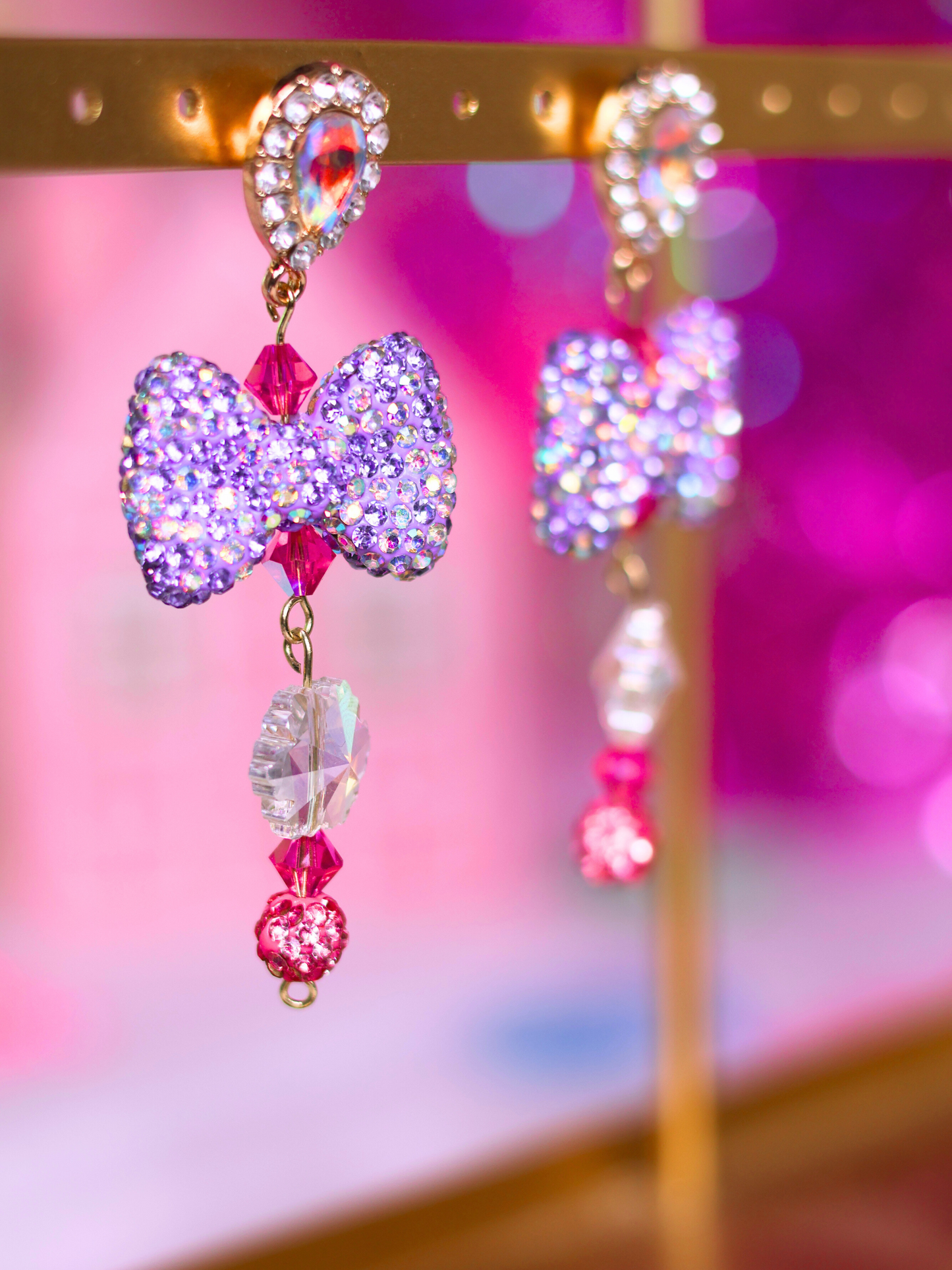 Pink Christmas Collection: Sparkling Bow Drop Earrings – Playful Glam for the Holiday Season